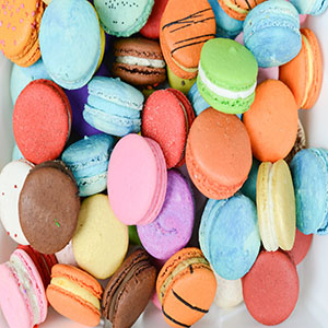 A light meringue-based cookie sandwich in an assortment of colors.